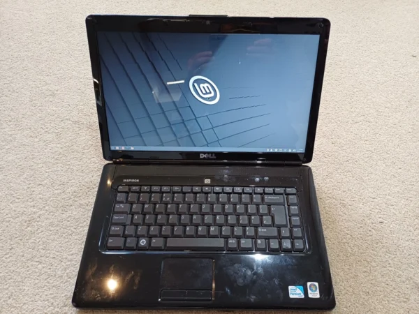 s-l1600 (8) Dell Inspiron 1545 Pink (Intel 2.0 processor, 3gb memory) - Linux Mint v22.3 is installed